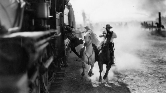 Ein Szenen-Foto aus dem Schwarzweiß-Stummfilm über Jesse James aus dem Jahr 1927